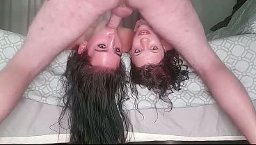 Guy making turns to fuck two whores mouths with their faces upside down