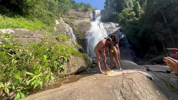 Behind-the-scenes amateur video with the 18-year-old black girl taking part in the waterfall outdoors (COMPLETE ON RED AND CHER)